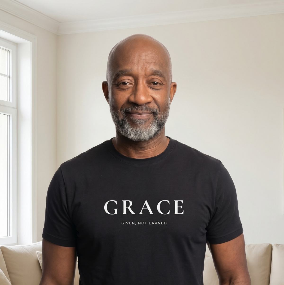 Man wearing a black “Grace” Christian T-shirt.