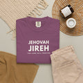 berry purple Jehovah Jireh Christian T-shirt with “The Lord Will Provide” typography, styled in a neutral flat lay.