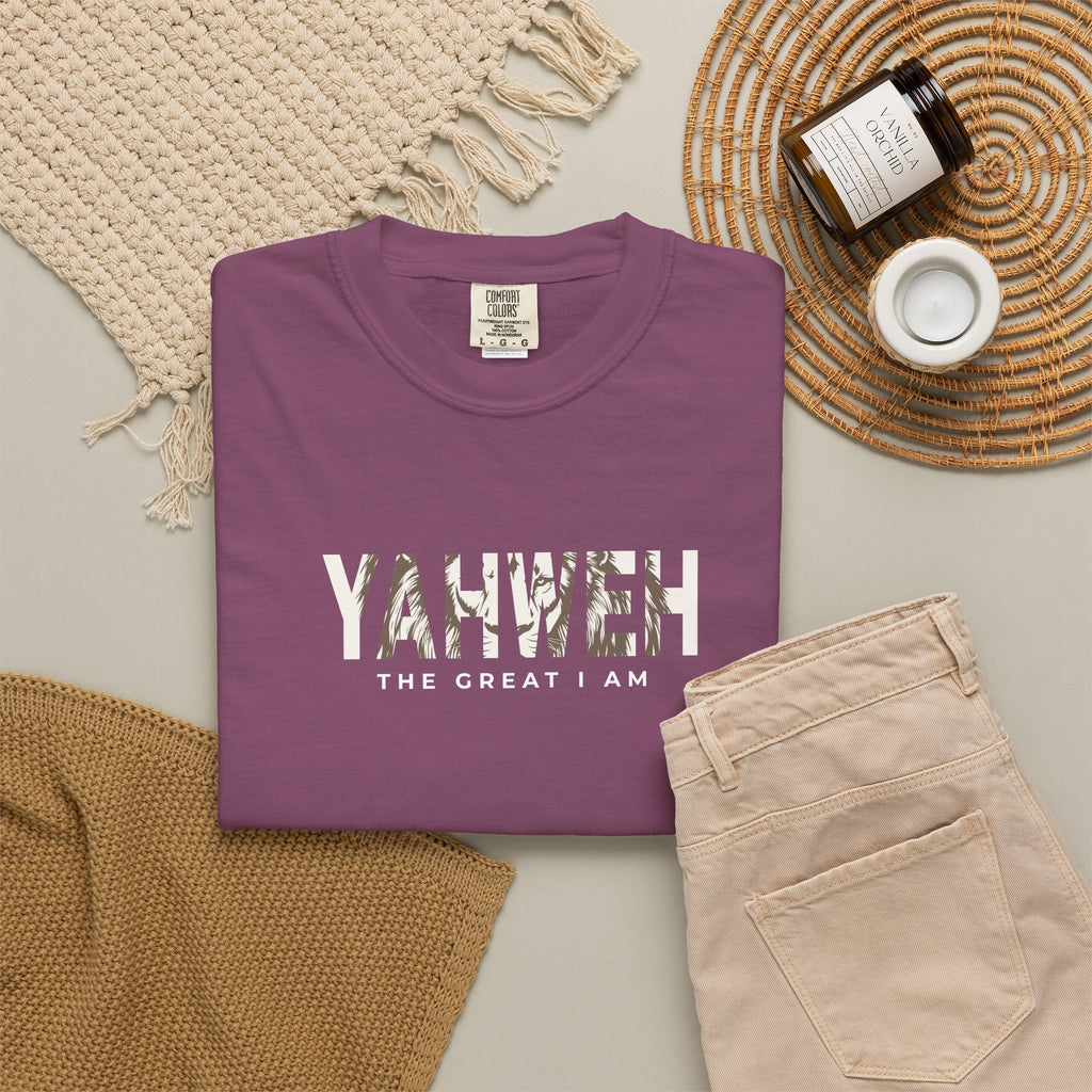 Berry purple Yahweh Christian T-shirt with “The Great I Am” small text, styled with beige jeans and neutral accessories.